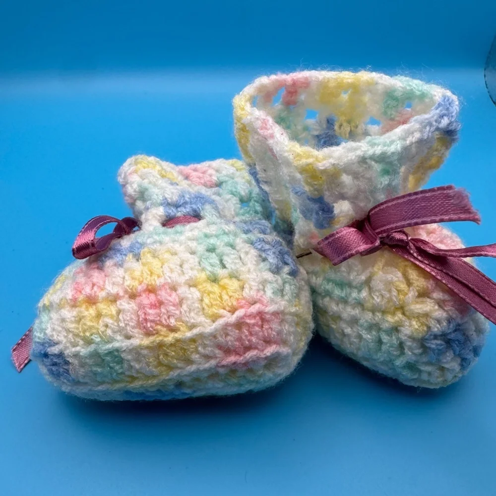 Hand crocheted baby booties pastel pink blue white yellow green